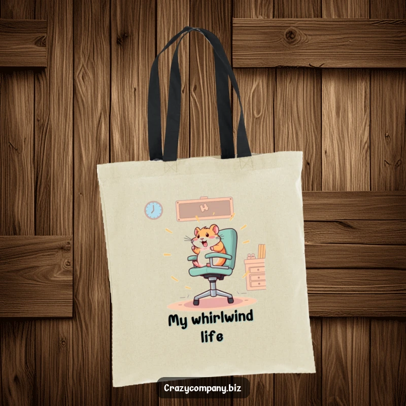 Funny tote bag featuring a frantic hamster spinning wildly on a large office chair, perfect for carrying daily items with energetic flair.